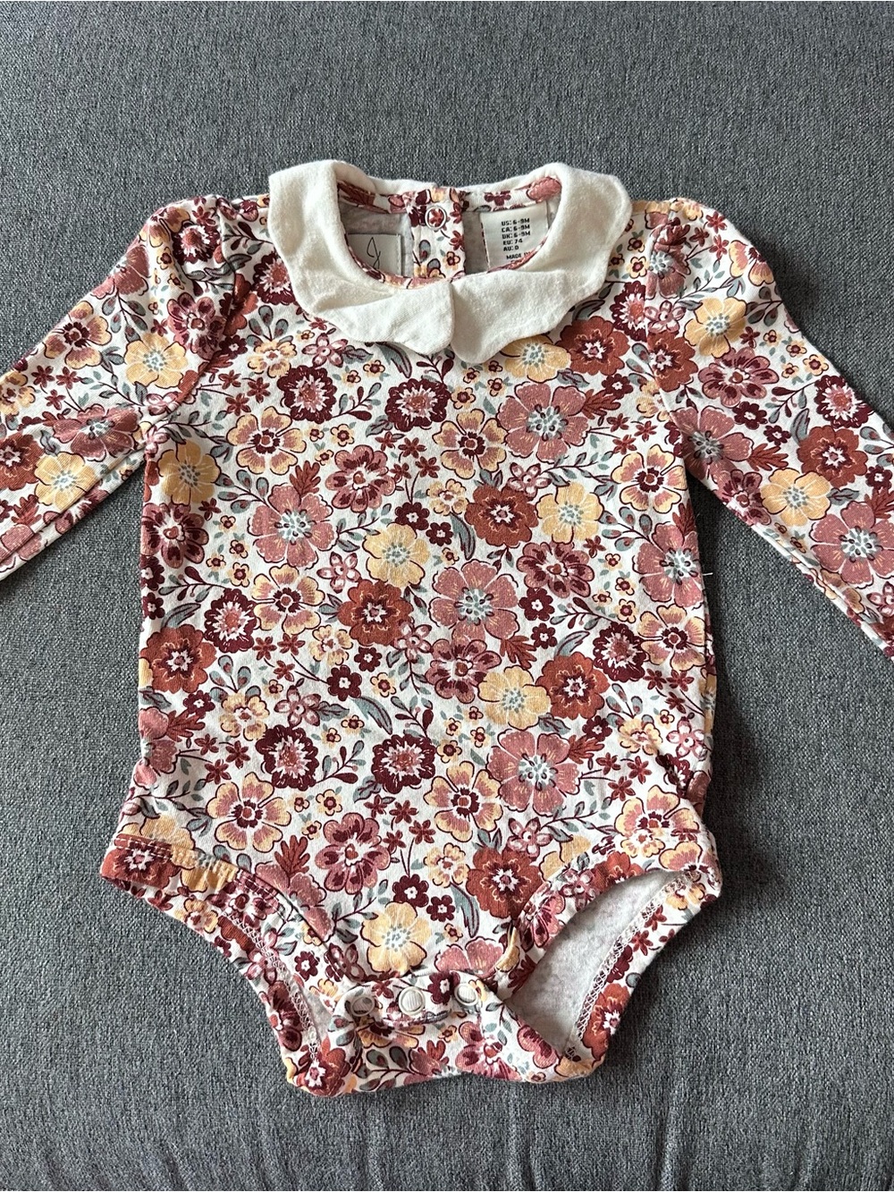 Long-Sleeve Floral One-Piece in Cream with Rust & Mustard